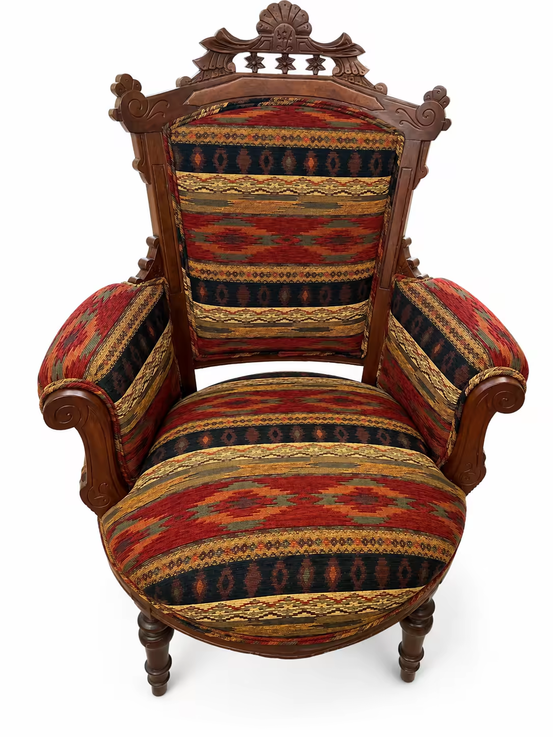An antique armchair reupholstered in a southwestern kilim weave